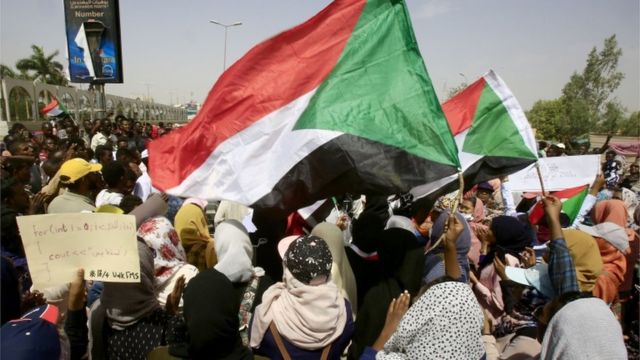 Demonstrators in Sudan outside the defence ministry in Khartoum