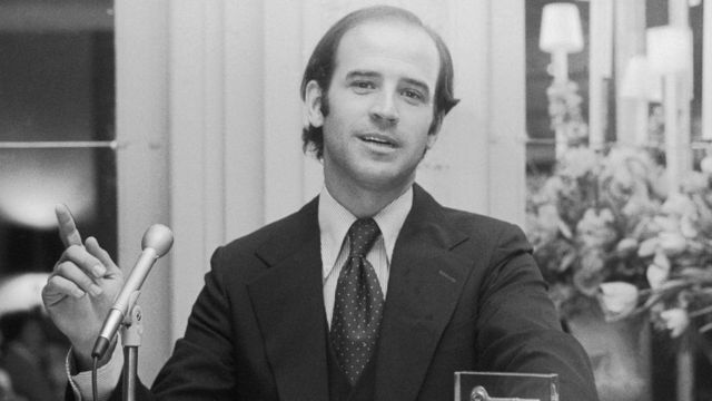 A young, balding Joe Biden sat at his desk in the 1970s.