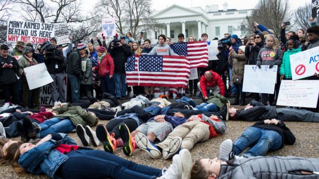 FEBRUARY 19: Demonstrators lie on the ground a 'lie-in' demonstration supporting gun control reform near the White House on February 19, 2018 in Washington, DC. According to a statement from the White House, 'the President is supportive of efforts to improve the Federal background check system.', in the wake of last weeks shooting at a high school in Parkland, Florida