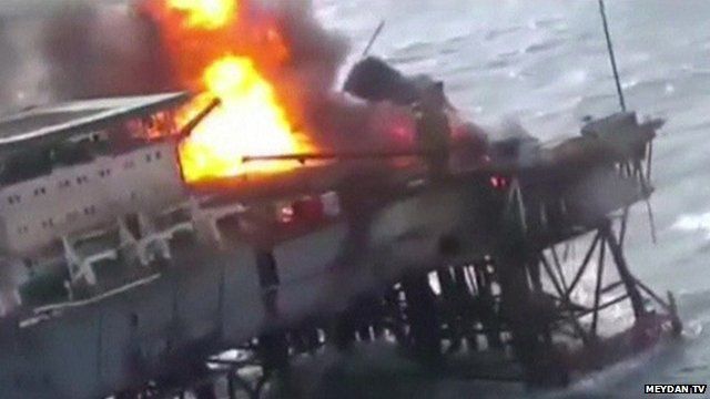 Helicopter-shot image of fire on oil rig