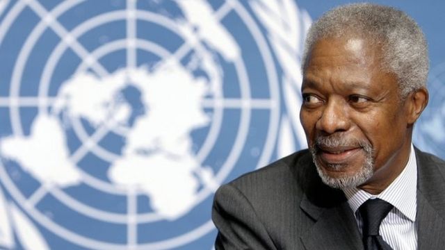 United Nations (UN) Secretary General Kofi Annan smiles in front of UN logo at a press conference 21 November 2006