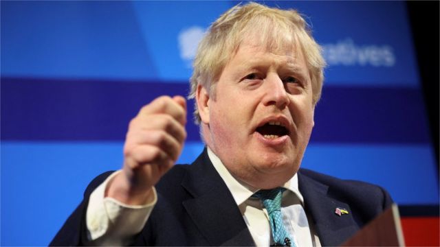 Boris Johnson addresses the Tory party spring conference in Blackpool