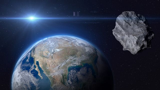 طرح گرافیکی از یک سیارک و کره زمین