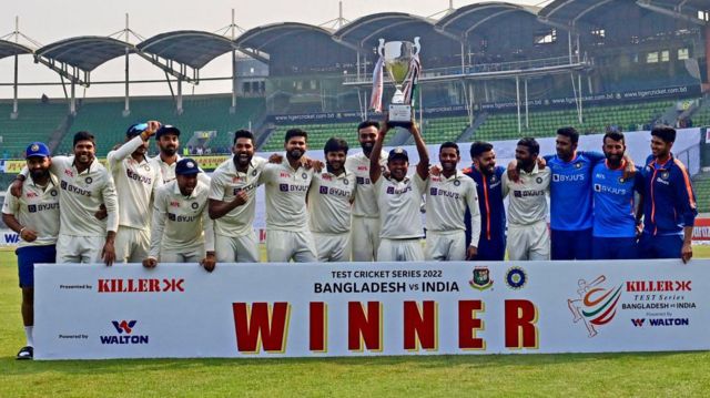 Indian cricket team with trophy