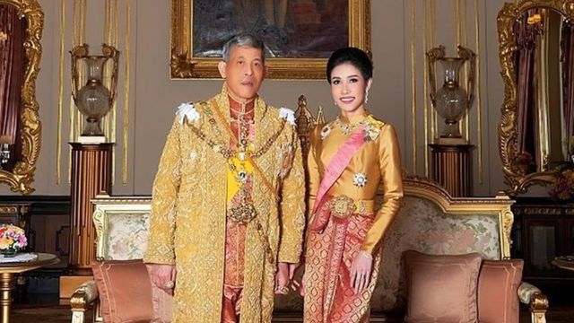 Thailand"s King Maha Vajiralongkorn and General Sineenat Wongvajirapakdi, the royal noble consort pose at the Grand Palace in Bangkok, Thailand, in this undated handout photo obtained by Reuters August 27, 2019.