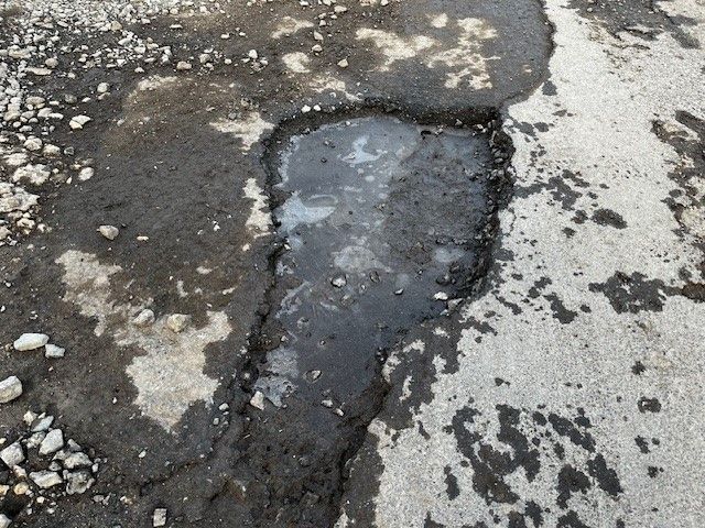 A pothole in Sutterton Drove