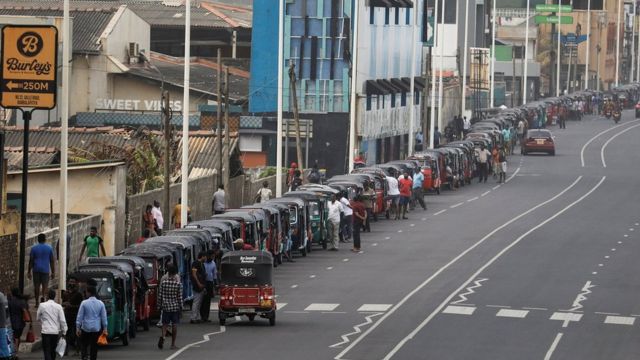 Three-wheelers queue to buy petrol due to fuel shortage, amid the country's economic crisis, in Colombo, Sri Lanka, in July.