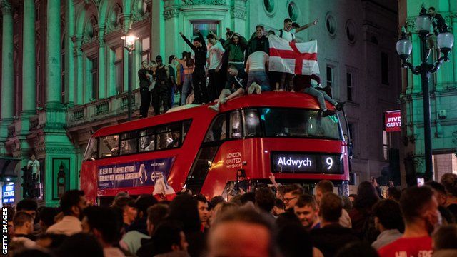 Fans celebrate in London after England reach the Euro 2020 final