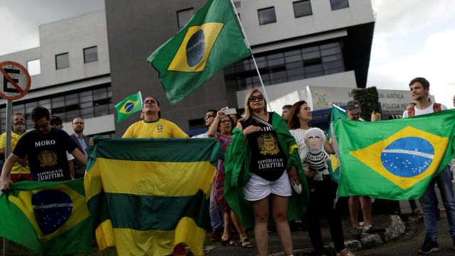 Supporters of Judge Sergio Moro demonstrate outside federal police HQ in Curitiba
