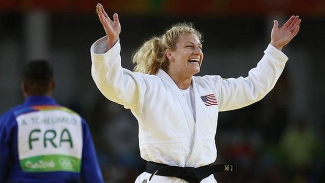 Kayla Harrison celebrates winning a judo match