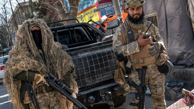 Armed Taliban militants guard access to universities.