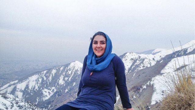 Ana on a mountain peak after she was released from Evin Prison in 2016