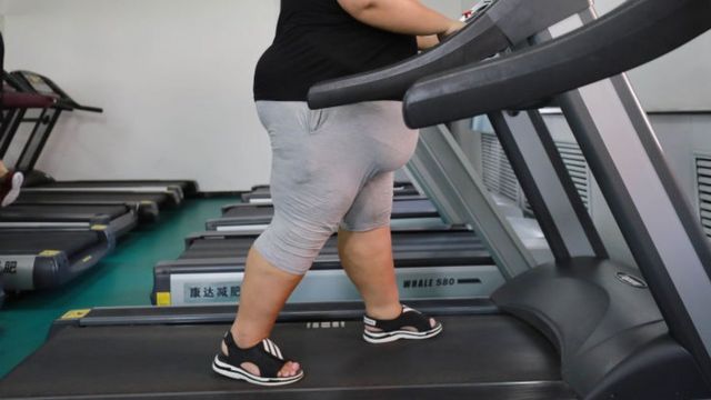 A woman on a treadmill in China