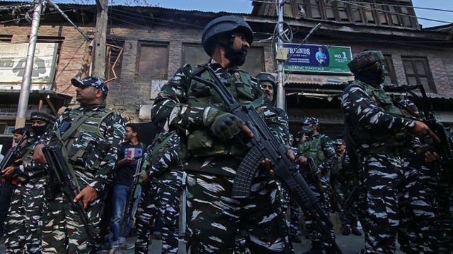 Indian paramilitary soldiers are seen near the site of attack in Srinagar, Kashmir on April 04, 2022.