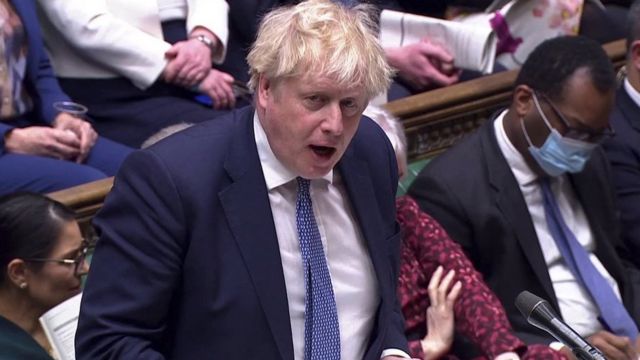 British Prime Minister Boris Johnson speaks during the weekly question time debate at Parliament in London, Britain, February 2, 2022, in this screen grab taken from video.