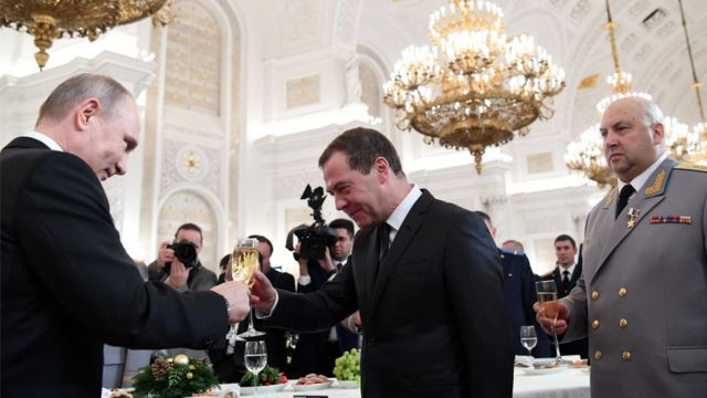 Vladimir Putin, Dmitry Medvedev and Sergey Surovikin.