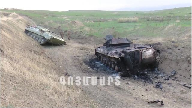 A grab taken from a handout video released by the so-called Nagorno-Karabakh (NKR) Defense Army, or Artsakh Defence Army, via Youtube claims to show tanks allegedly destroyed in shelling, artillery and air attacks along the front at Nagorno-Karabakh Republic, on a border of Armenia and Azerbaijan, 27 September 2020.