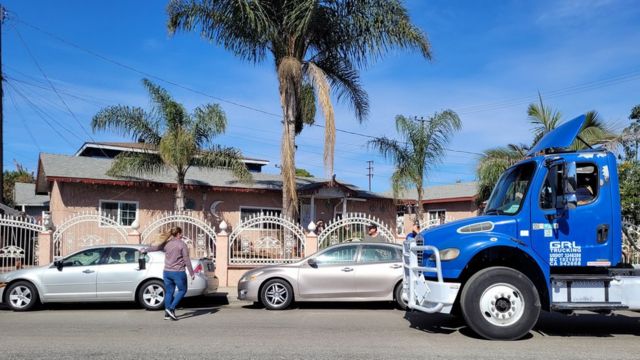 Truck passing a house in Wilmington