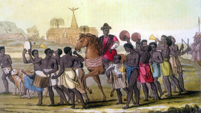 Un oba o soberano del reino de Benín a caballo en una ilustración de principios del siglo XIX.