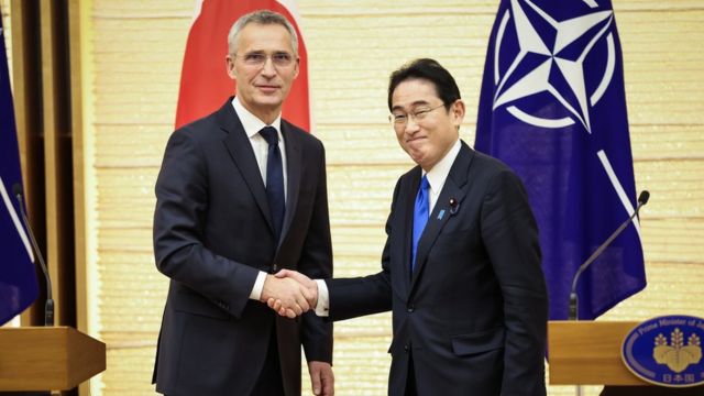 NATO Secretary-General Jens Stoltenberg (L) and Japanese Prime Minister Fumio Kishida (R) shake hands after holding a joint media briefing on January 31, 2023 in Tokyo, Japan. Stoltenberg visits Japan to strengthen bilateral ties between the country and the E.U.