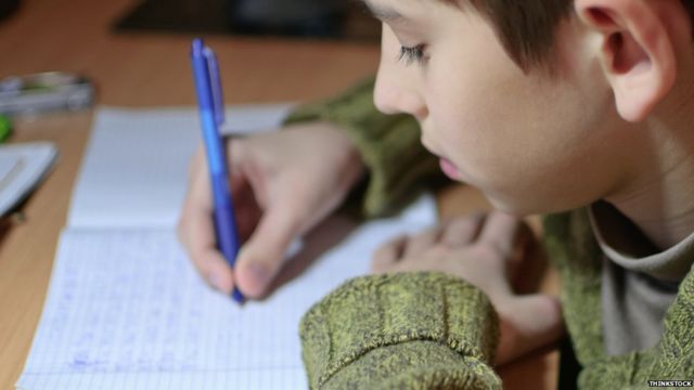 Teachers 'wasting time on marking in coloured pens'