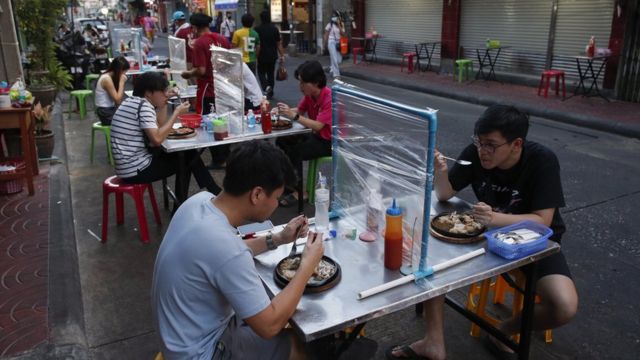 People eating noodles