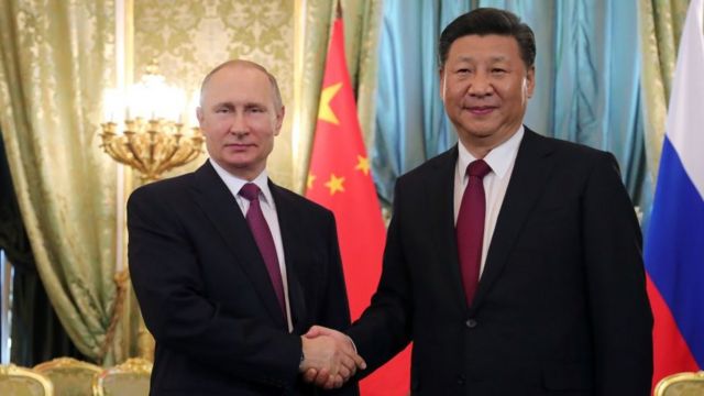 Vladimir Putin y Xi Jinping,