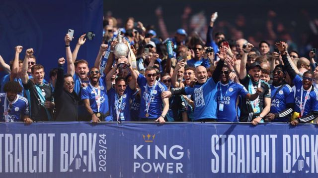 Ricardo Pereira, Marc Albrighton and Jamie Vardy of Leicester City lift the Championship Trophy during the Leicester City trophy parade on May 05, 2024 in Leicester, England