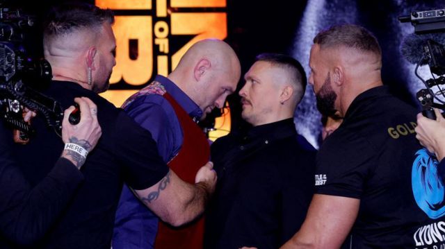 Тайсон Фьюри и Александр Усик столкнулись лбами