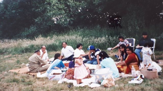 Bhavna Patani and her family seated, eating: