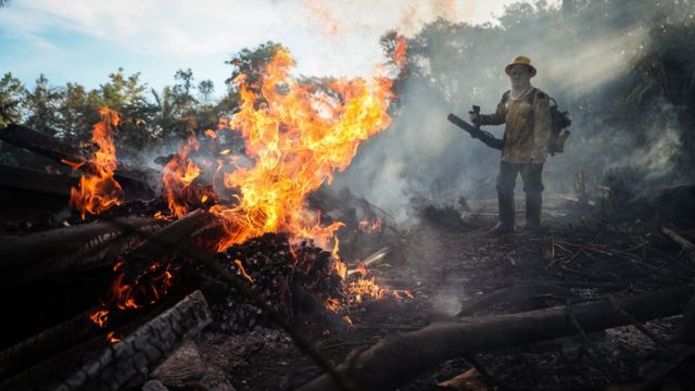 A firefighter in the Amazon