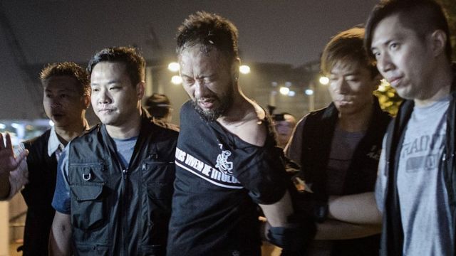 资料图片:曾健超于2014年10月15日凌晨被捕