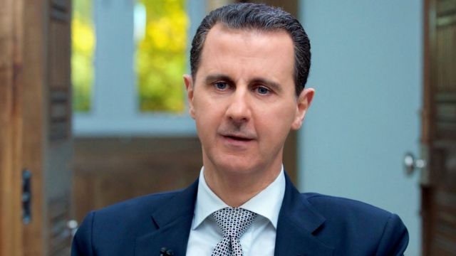 アサド大統領は、シリアは化学兵器を廃棄したと主張した（12日、ダマスカス)