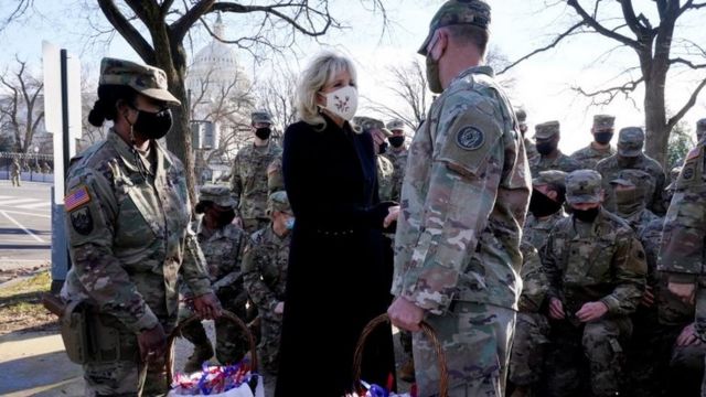 U.S. first lady Jill Biden surprises National Guard members outside the Capitol with chocolate chip cookies