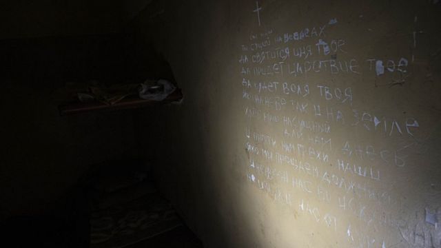 Молитва на стене камеры в Балаклее