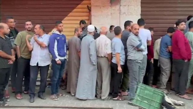 People queuing in Gaza