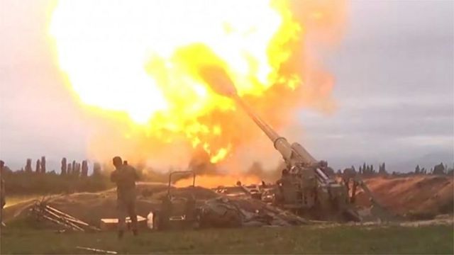 Azeri armed forces firing artillery during clashes between Armenia and Azerbaijan over the territory of Nagorno-Karabakh