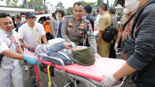 Rescue workers carry an injured earthquake victim at a hospital in Cianjur, West Java, Indonesia, November 21, 2022.