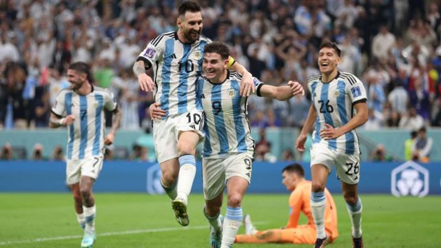Julian Alvarez celebrates his goal with Lionel Messi