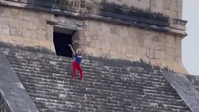Tourist on top of Mexican Pyramid