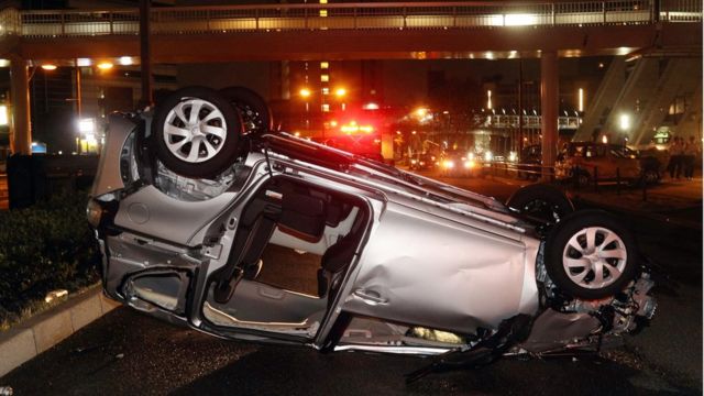 Overturned car in Osaka