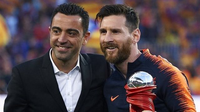 Xavi and Lionel Messi