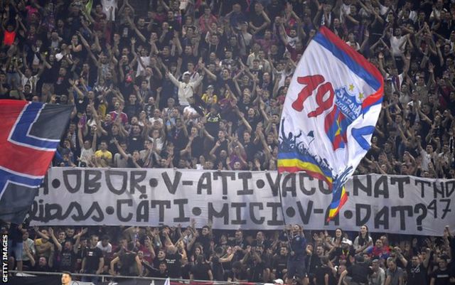 The fans from Steaua Bucuresti fight with the police in the stands News  Photo - Getty Images