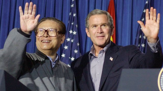 US President George W.  Bush and Chinese President Jiang Zemin after a joint press conference in Texas in 2002.