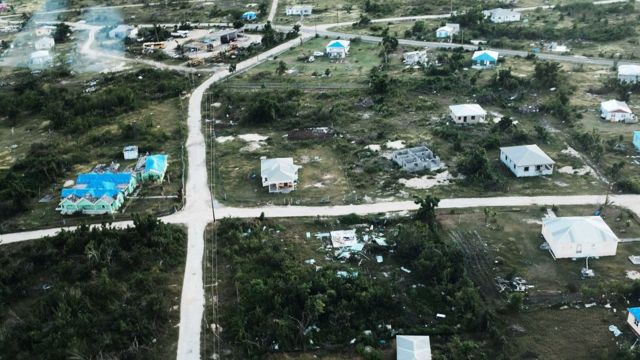 An aerial view of damaged homes on the nearly destroyed island of Barbuda on December 8, 2017 in Cordington, Barbuda.