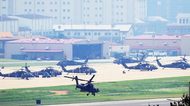 An Apache helicopter takes off from US base Camp Humphreys in Pyeongtaek, south of Seoul, South Korea, 5 August 2019