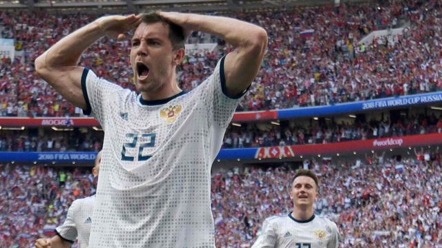 Russia forward Artem Dzyuba celebrates after scoring a penalty against Spain at the World Cup