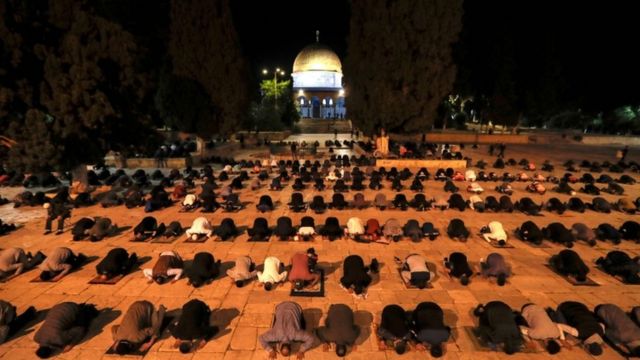 Palestinians perform the dawn prayer inside the Al-Aqsa mosque compound, Islam's third holiest site, in Jerusalem's Old City