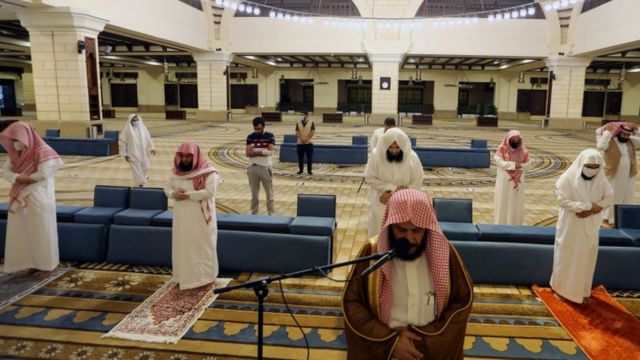 Muslims pray at a mosque in Saudi Arabia