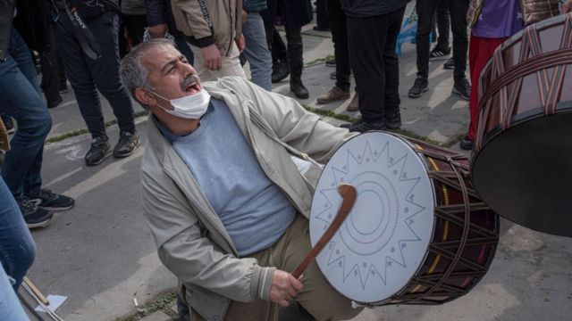 A man seen drumming during the celebration of the Kurdish new year at Istanbul
